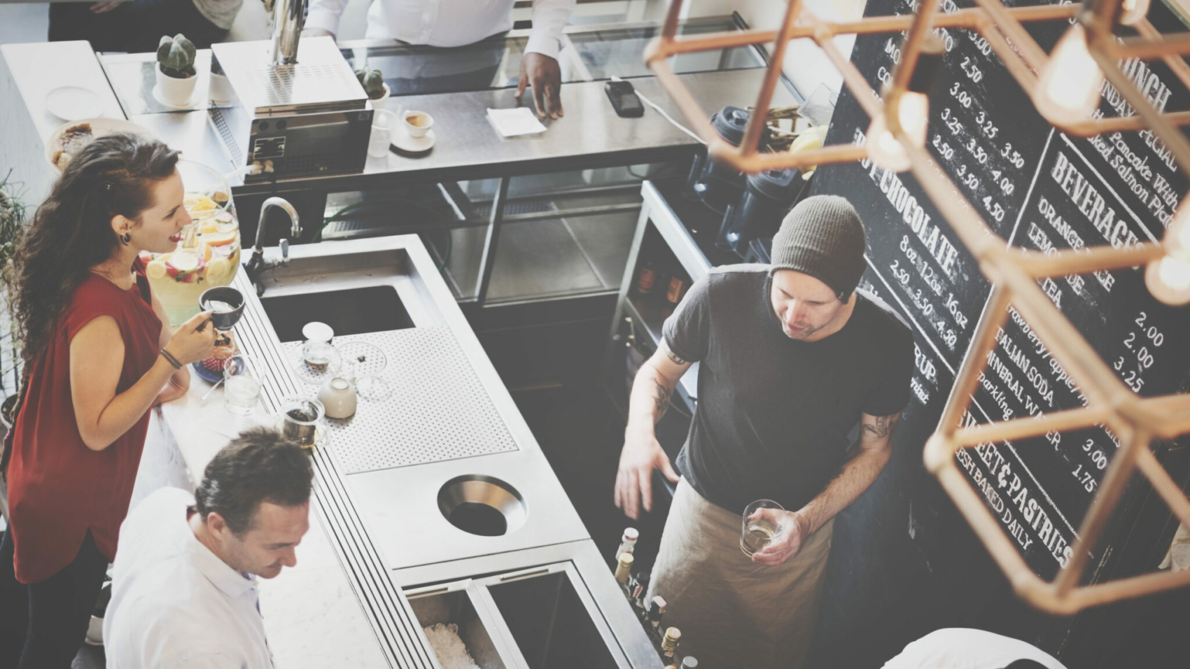 Group of diverse people ordering coffee cafe shop